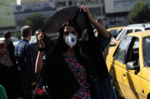 A woman wearing a protective face mask walks in a street, following the outbreak of the coronavirus disease (COVID-19), in Tehran, Iran, June 28, 2020. WANA (West Asia News Agency) ATTENTION EDITORS - THIS PICTURE WAS PROVIDED BY A THIRD PARTY,Image: 536741904, License: Rights-managed, Restrictions: THIS IMAGE HAS BEEN SUPPLIED BY A THIRD PARTY. IT IS DISTRIBUTED, EXACTLY AS RECEIVED BY REUTERS, AS A SERVICE TO CLIENTS., Model Release: no, Credit line: WANA NEWS AGENCY / Reuters / Forum